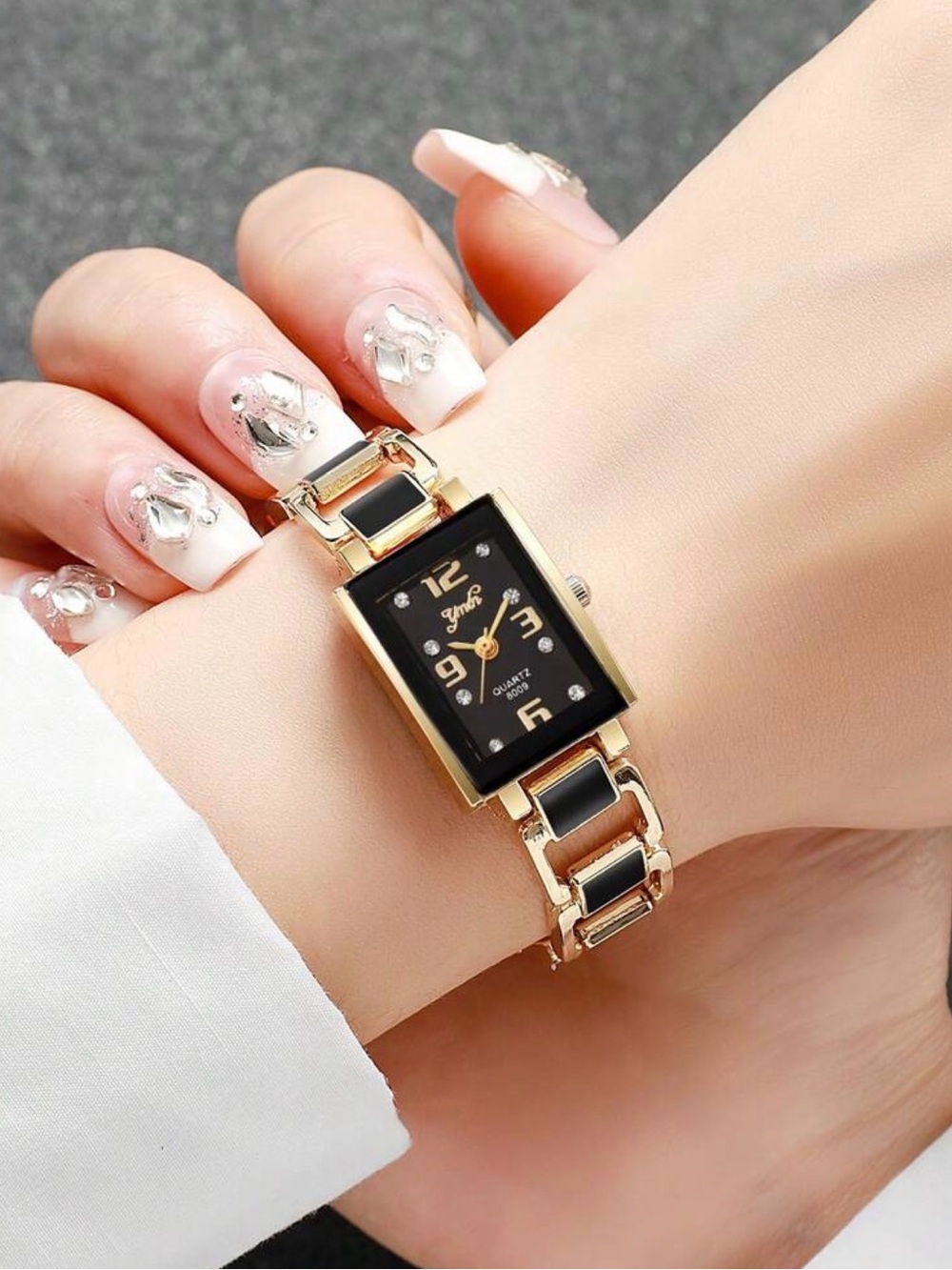 Gold and Black Rectangular Bracelet Watch